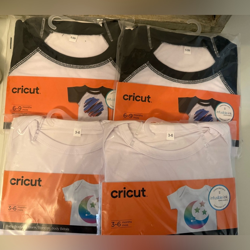 Cricut White Baby Bodysuit & black and white body suits for crafting.